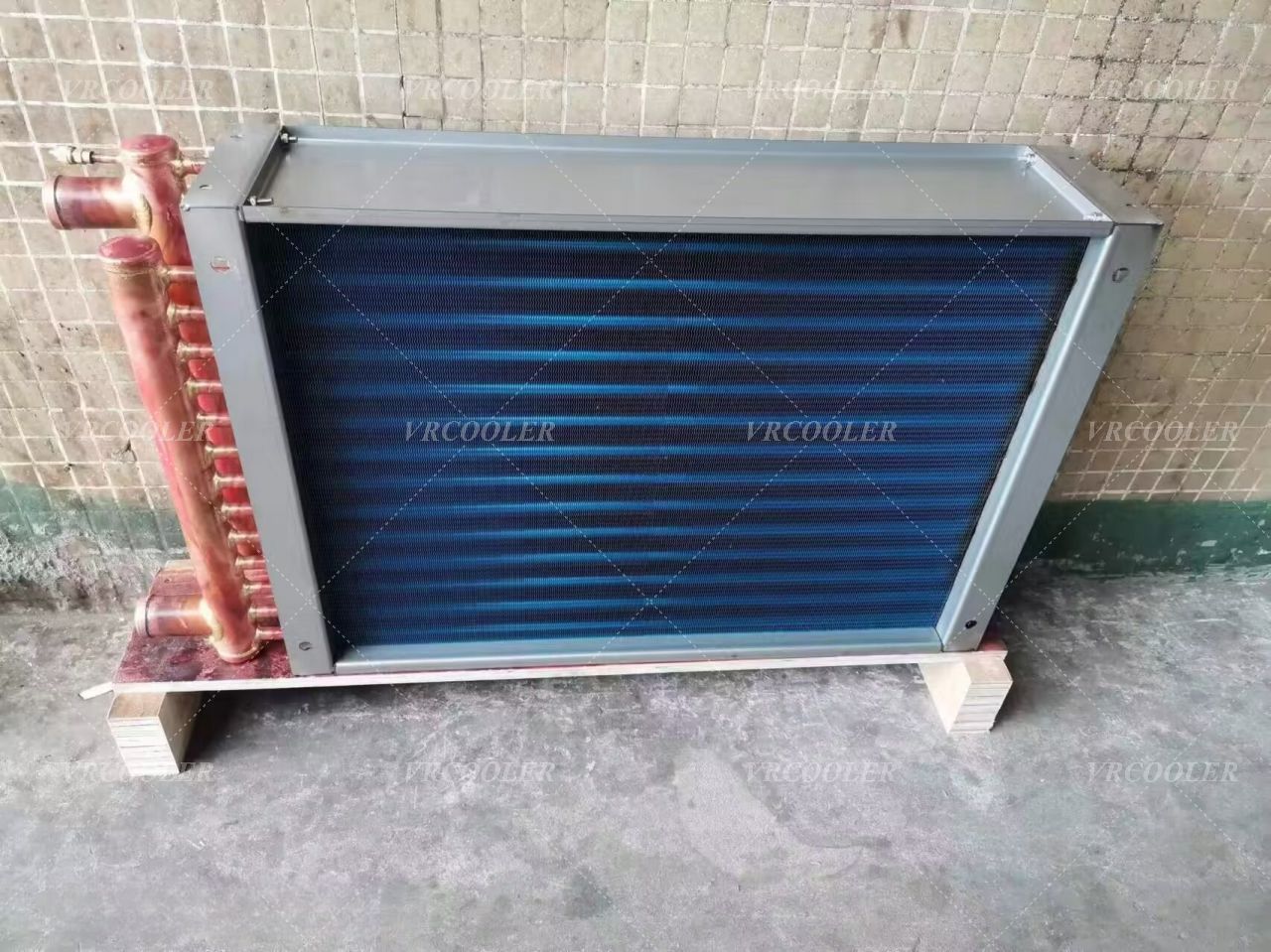 What are the benefits of using a PED Certified Custom DX Evaporator Coil in a heat pump?