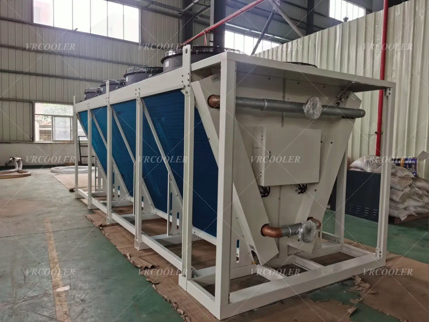 Can free cooling dry coolers work with existing chillers?