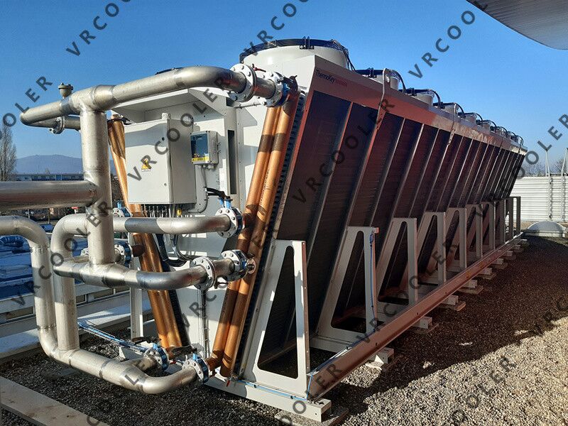 What is “free cooling” in a data center dry cooler system?