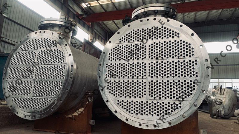 For shell and tube heat exchangers, why is the temperature difference at the high temperature end not lower than 20°C?