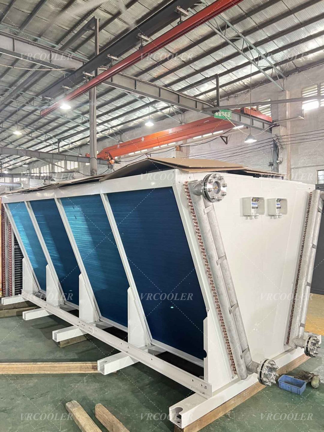 When is a dry cooler especially useful in a PVT system?