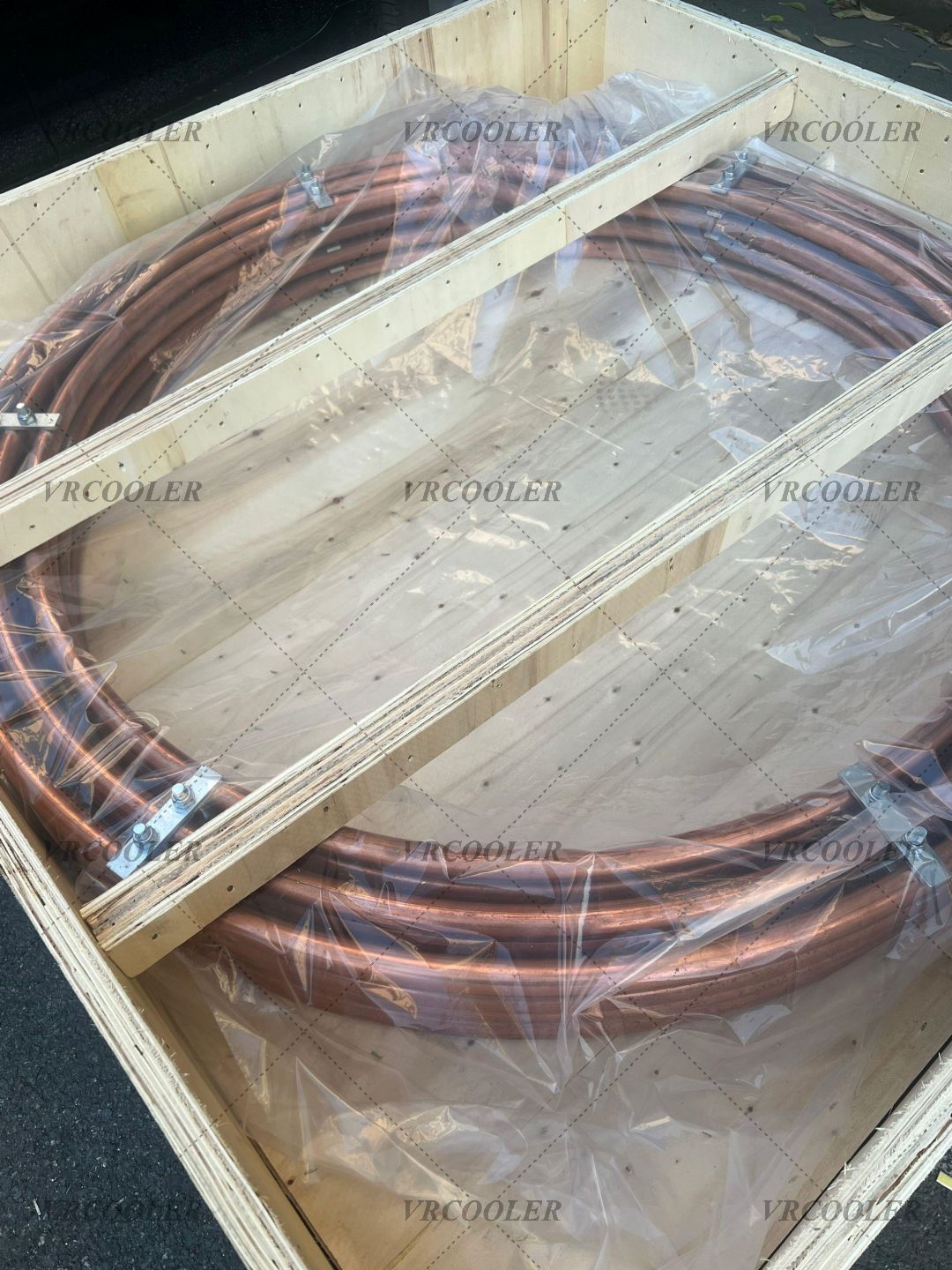 How does a turbine guide bearing oil cooler work?