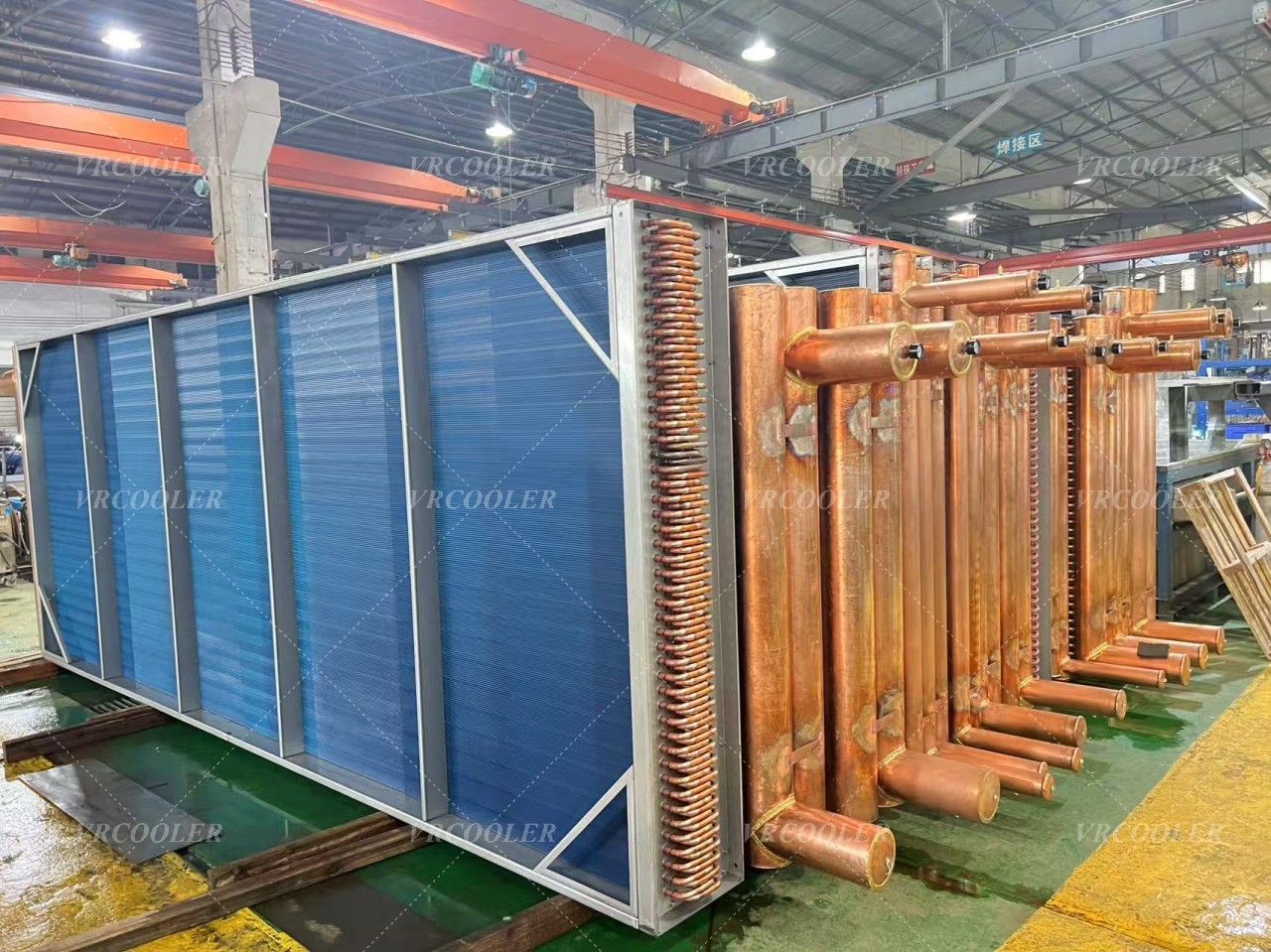 Why do some condenser coils use blue or coated fins?